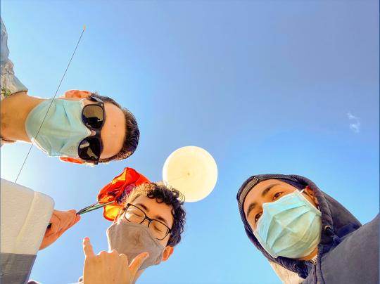 Balloon is ready. From left to right: Nathan Candler, David Story and Andres Rivera