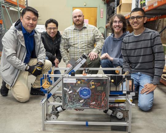 Dr. Nansong Wu along with some of the students involved in NASA Lunabotics