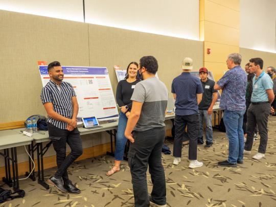 Engineering Students Presenting along with Dr. Mohamed Salem and Mr. Chris Stewart